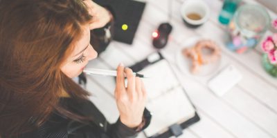 woman-hand-desk-office.jpg